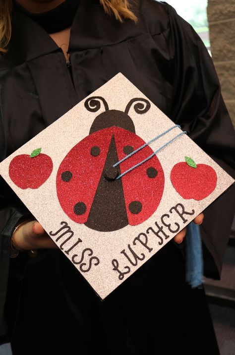 Lady Bug graduation cap teacher Ladybug Graduation Cap, Graduation Cap Teacher, Ladybug Hat, Teacher Graduation Cap, College Graduation Photos, Grad Cap, Graduation Photos, Graduation Cap, College Graduation