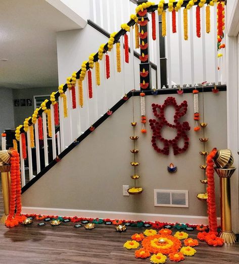 Flower Decoration For House Warming Indian, Diwali Staircase Decor, Staircase Decor Ideas Indian, Staircase Flower Decoration Indian, Staircase Flower Decoration, Rangoli For House Warming, Diwali Gate Decoration, House Warming Rangoli, Home Inauguration Decoration