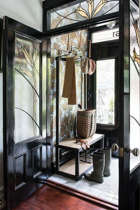 a beautiful vintage entryway done with black glass doors and transom windows is a fantastic space with plenty of natural light Entry Vestibule, Sas Entree, January Wallpaper, House Images, Nordic Winter, Grand Entryway, Transom Windows, Pinterest Images, Free Phone Wallpaper