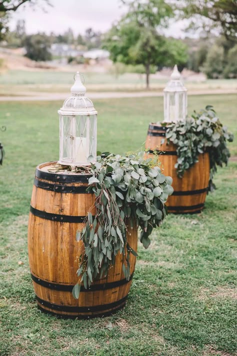 How To Decorate Wine Barrels For Wedding, Decorate Wine Barrel Wedding, Bourbon Barrel Decor Wedding, Decorated Wine Barrels Wedding Ideas, Barrel At Wedding, Wine Barrell Ideas Wedding, Wine Barrel Cocktail Table Wedding, Whisky Barrel Wedding Decor, Wedding Barrel Decor