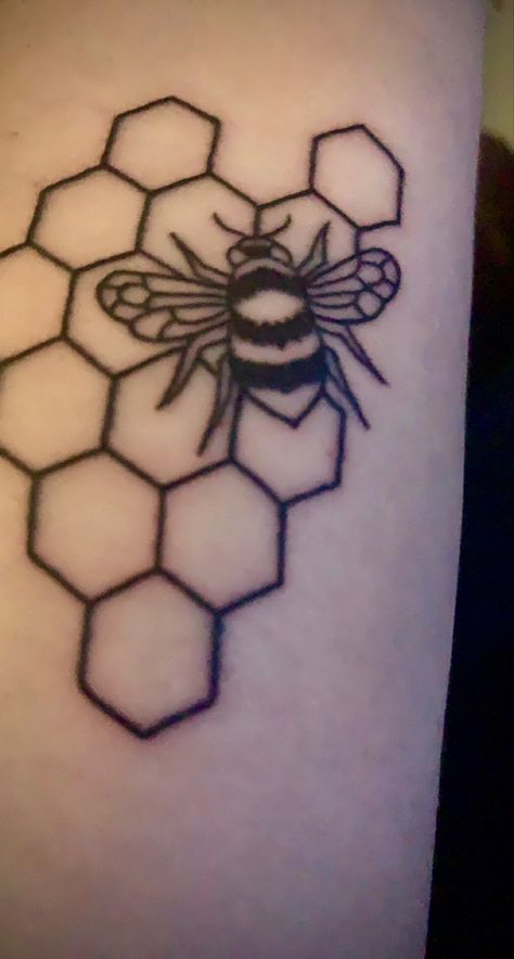 Black and grey tattoo of a bumble bee on honeycomb Honey Bee Drawing, Honeycomb Tattoo, Black And White Bee, Gay Tattoo, Bumble Bee Tattoo, Working Bee, Bee Drawing, Tattoo Board, Bee Tattoo