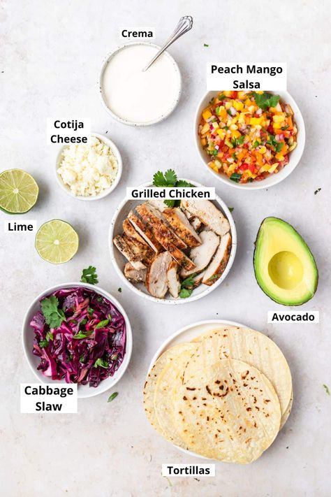 Grilled Chicken Tacos with Mango Salsa Chicken Tacos Mango Salsa, Chicken Cabbage Tacos, Grill Chicken Tacos, Chicken Tacos With Slaw, Mango Chicken Tacos, Grilled Chicken Tacos Recipe, Mango Salsa Tacos, Chicken Tacos With Mango Salsa, Peach Mango Salsa