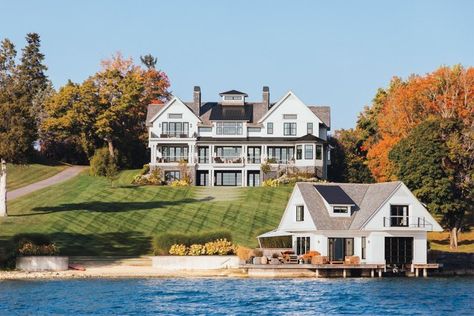 Sleek & Traditional Design Aesthetics Convene in a Hudson Valley Home - Cottages & Gardens Walpole Outdoors, Skaneateles Lake, Vanderbilt Mansions, House New York, Summer Travel Destinations, Thom Filicia, Carriage Doors, Modern Lake House, Concrete Coffee Table