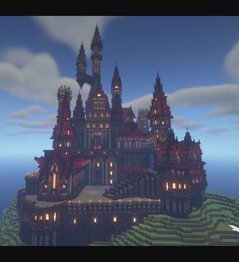 Evil Castle with red roofs and a stone base Minecraft Mountain Castle Blueprints, Castle Inspo Minecraft, Minecraft Gothic Castle Blueprints, Minecraft Victorian Castle, Castle Exterior Minecraft, Dracula Castle Minecraft, Minecraft Nether Castle Ideas, Minecraft Vampire Mansion, Large Minecraft Castle