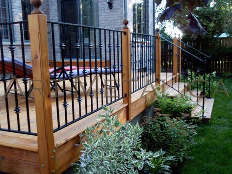 deck railing ideas - Google Search Iron Deck Railing, Rod Iron Railing, Porch Railing Designs, Iron Stairs, Deck Stair Railing, Iron Pergola, Wrought Iron Railings, Front Porch Railings, Outdoor Stair Railing