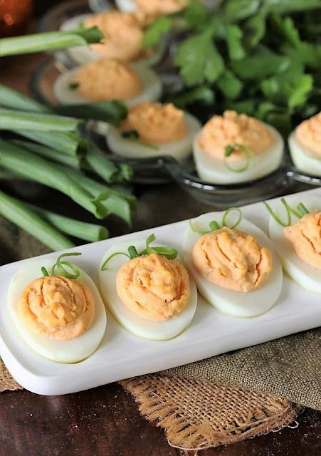 Pumpkin Shaped Deviled Eggs Image Baby Shower Deviled Eggs, Pumpkin Deviled Eggs, Thanksgiving Deviled Eggs, Southern Deviled Eggs, Food Garnish, Halloween Food Dinner, Eggs Image, Thanksgiving 2024, How To Make Pumpkin