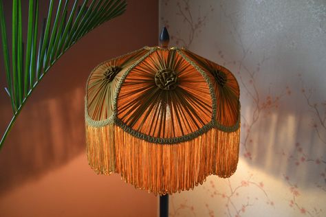 Lampshade antique gold gathering with fringe. Beautiful lampshade handcrafted by putting manual gathering on all the panels by highly crafted artisan. Further beautified by putting rayon fringe at the bottom. This lampshade is handmade & may have slight imperfections (as you may see) which are inherent to hand-crafted items and should be viewed as part of its natural beauty and charm. They may show subtle variations and small flaws which are part of the individual character and charm of handicra 70s Lampshade, Fringe Lampshade, Retro Lampshade, Victorian Lampshades, Handmade Lamps, Diy Lamp Shade, Lamp Shades, Lamp Bases, Lampshades