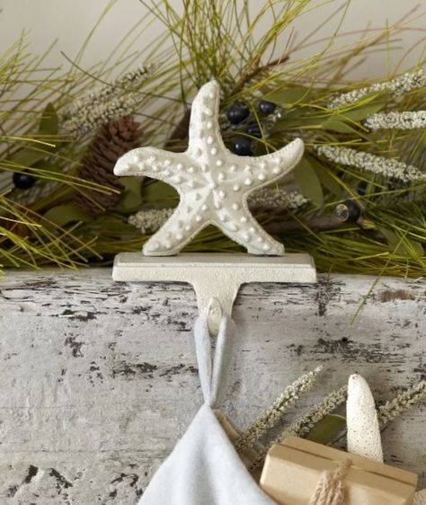 Coastal Christmas Mantel Decor Ideas. Featured on Completely Coastal: http://www.completely-coastal.com/2017/11/coastal-christmas-mantel-decor.html Hang your stockings coastal style! Coastal Christmas Stockings, Stocking Hooks, Christmas Mantel Decor, Round Candle Holder, Coastal Christmas Decor, Beachy Christmas, Christmas Mantle Decor, Seaside Decor, Stocking Holder