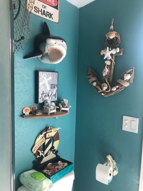 Shark above toilet- beach bathroom 🦈 #beachbathroom #sharkhead #mermaid Jaws Bathroom Theme, Deep Sea Bathroom Theme, Shark Themed Bathroom, Jaws Bathroom, Shipwreck Bathroom, Kids Ocean Bathroom, Sea Bathroom Ideas, Kids Beach Bathroom, Pirate And Mermaid Bathroom