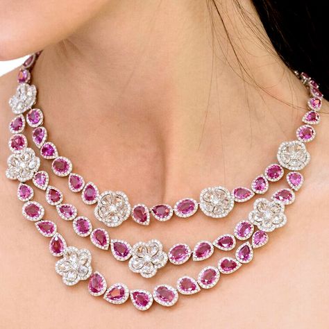 This pink sapphire necklace from Avakian sees three irregular strands of pink sapphires interspersed with rose-cut diamonds formed into flower shapes. The necklace has 31 carats of diamonds and 77 carats of pink sapphires, and has matching earrings. Discover the jewellery house from Geneva give fashion a playful spin: http://www.thejewelleryeditor.com/videos/fine-jewellery/house-of-fun-avakian-the-most-playful-jeweller-in-geneva/?action=play #jewelry