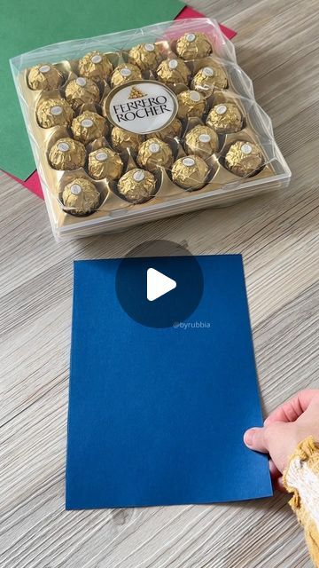 Rubbia on Instagram: "Chocolate Party Favours   #fyp #ferrerorocher #flowers #gift #giftideas #gifthampers #byrubbia #instagood #presents #anniversary #wedding #occasion #explore #chocolate #ideas #tips #diy #london #partytreats #giftwrapping #giftwrap" Chocolate Box Wrapping Ideas, Lindt Chocolate Gift Ideas Christmas, Gift Favors Ideas Birthday, Christmas Dessert Gift Boxes, Diy Thank You Gifts For Coworkers, Chocolate Giveaways Ideas, Chocolate Wrapping Ideas Packaging, Regular Pioneer Gifts Ideas, Lindor Chocolate Gift Ideas