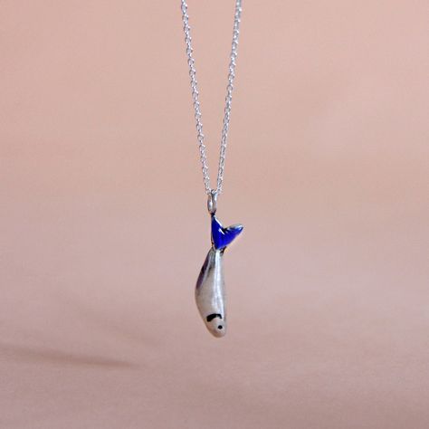 Silver choker necklace with a charm in the shape of a sardine. Blue Enamel The stretched silver chain measures 40cm or 45cm (choose one of two options). NOTE ● Please indicate your phone number in your order. This will help the delivery service to deliver your order. ➤ All our designs are handmade, the color may be slightly different from one to another and from the ones shown in the photo. The piece shown in the picture is not real size. The photo has been enlarged to show the details of the de Silver Necklace With Pendant, Handmade Silver Pendant, Handmade Silver Necklace, Silver Charm Necklace, Fish Necklace, Silver Choker Necklace, Blue Pendant, Silver Choker, Chain Silver