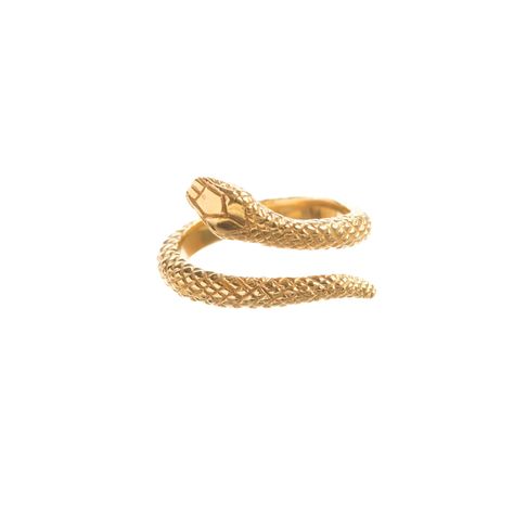 This classic snake ring is handmade to order in our London studio using recycled .925 sterling silver. Also available in solid 9ct or 18ct solid yellow or rose gold. Prices for solid gold are available upon request. The body of the snake is 3mm wide. Available in sizes E to N. Protection From Evil Spirits, Nature Jewellery, Snake Ring Gold, Opal Jewelry Set, Protection From Evil, Serpent Ring, Hoop Charms, Luxe Jewelry, Snake Jewelry