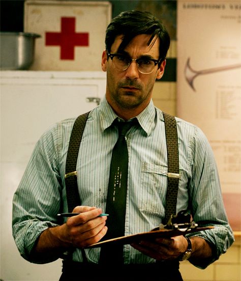 Jon Hamm. Hot Damn! He even makes suspenders look sexy..excuse me while I pick my jaw up from the floor! John Hamm, Suspenders Outfit, Don Draper, Jon Hamm, Sucker Punch, Suspenders Men, Wearing Glasses, Mad Men, Popsugar