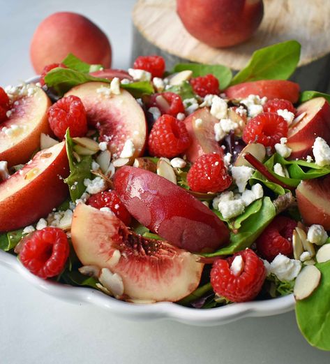 White Peach Raspberry Almond Salad. Fresh white peaches or nectarines, plump raspberries, candied almonds, creamy feta or white cheddar cheese all tossed with a sweet dressing. The perfect summer raspberry peach salad. www.modernhoney.com Greek Yogurt Breakfast Bowl, Watermelon Arugula Salad, Almond Salad, White Peaches, Modern Honey, Sweet Dressing, Peach Raspberry, Creamy Feta, Basil Vinaigrette