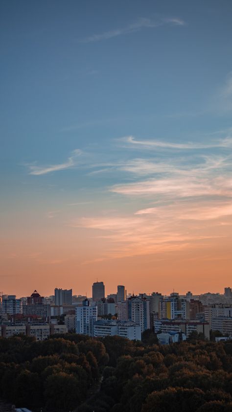 A plane flying over a city at sunset photo – Free Minsk Image on Unsplash City At Sunset, Plane Flying, Sunset Images, Minsk Belarus, Tropical Wallpaper, Light Building, Orange Wallpaper, City Wallpaper, Dog Images