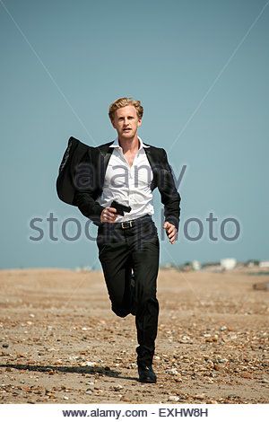 Running Towards Camera, Cool Tech Gadgets Electronics, Long Black Coat, Human Poses Reference, Human Poses, Man Running, Black Suits, Long Black, Pose Reference