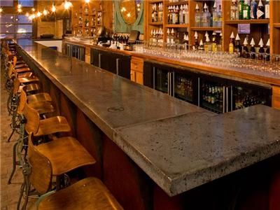 Concrete Countertops  Solid Concrete Tops  Milwaukee, WI    distressed concrete look... with the wood accents. Cement Bar Top, Taproom Ideas, Concrete Bar Top, Lake Bar, Stained Concrete Countertops, Outdoor Wood Bar, Cement Countertops, Brewery Ideas, Bar Renovation