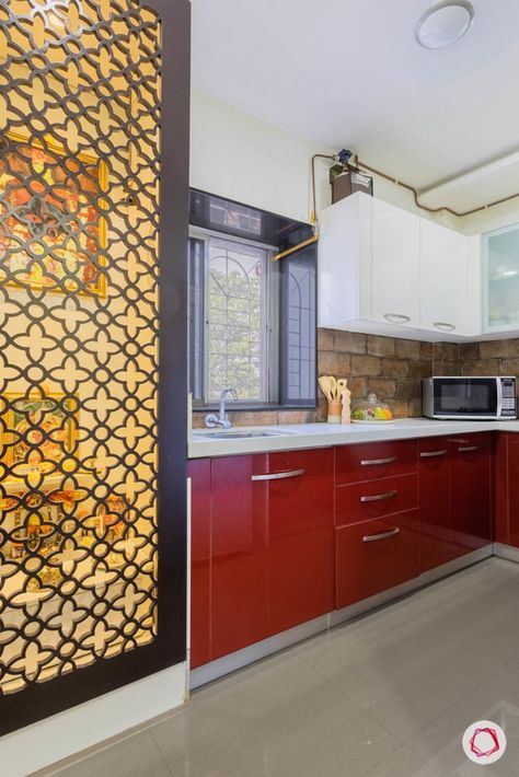 jali design-kitchen-pooja-door-red-cabinets-white-countertop-microwave Small Pooja Room Design, Jali Door Design Modern, Jali Partition, Jali Door Design, Jaali Door, Jali Designs, Jali Door, Mdf Jali, Kitchen Niche