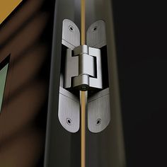 Tectus Hinge installation photo showing concealed TE540 Concealed hinge Secret Door Bookshelf, Types Of Hinges, Kitchen Cabinets Hinges, Fiberglass Entry Doors, Welcome Signs Front Door, Hidden Hinges, Rope Shelves, Flush Doors, Concealed Hinges