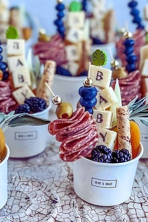 How to Craft Charcuterie Cups for a Baby Shower (with 11  Examples) - One Sweet Nursery Baby Shower Charcuterie, March Baby Shower, Baby Shower Appetizers, Baby Shower Finger Foods, Charcuterie Cups, Veggie Cups, March Baby, Sweet Nursery, Christmas Traditions Family