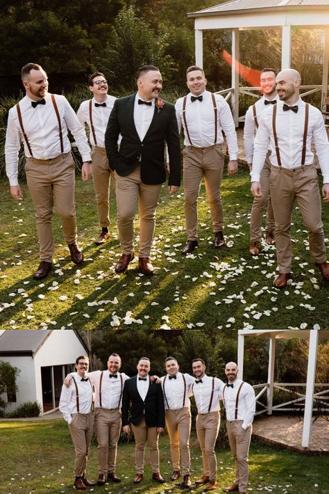 Stylish suspenders and tan chinos make for a summery groomsmen ensemble. We love the bowties and earthy tones! Brown And Green Groomsmen Attire, Khaki Pants With Suspenders Wedding, Groomsmen Khaki Pants, Groomsmen Suspenders And Bowties, Groomsmen Attire Green, Groomsmen White Shirt Khaki Pants, Groomsmen Attire Khaki, Groomsmen Attire Brown Suspenders, Tan Suspenders Groomsmen