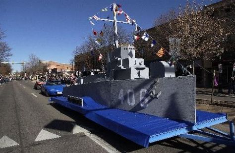 Battleship Float Ideas, Board Game Float Ideas, Navy Parade Float, Life Size Battleship Game, How Do Boats Float, Floats For Parade, Parade Float Supplies Walmart, Christmas Floats, Vacation Packing Checklist