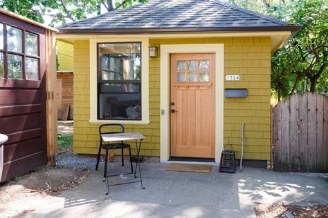 An old garage originally built in 1904 and re-purposed into a backyard tiny home in Portland, Oregon. Tiny Backyard House, Converted Shed, Tiny Guest House, Porsche Garage, Backyard Guest Houses, Garage To Living Space, Tiny House Swoon, Converted Garage, Backyard House