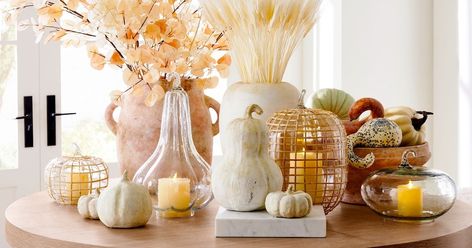 The Best Pottery Barn Fall Decor for 2022 | The Everygirl Pottery Barn Fall Decor, Terracotta Pumpkins, Rattan Pumpkins, Pottery Barn Fall, Pumpkin Pottery, Pottery Barn Pumpkin, Pottery Barn Lighting, Glass Cloches, Pottery Barn Black