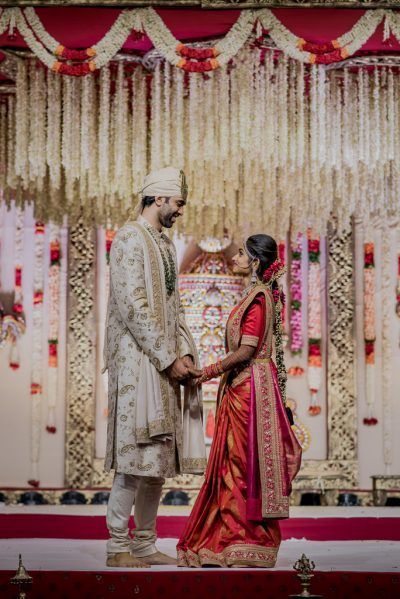 An Elegant Hyderabad Wedding With Stunning Decor And Perfectly Coordinated Bride & Groom Hyderabad Brides, South Indian Bride And Groom, Couple Wardrobe, Hyderabad Wedding, Sacred Ceremony, Designs Kurti, Couples Pic, Candid Couple, Coordinated Outfits