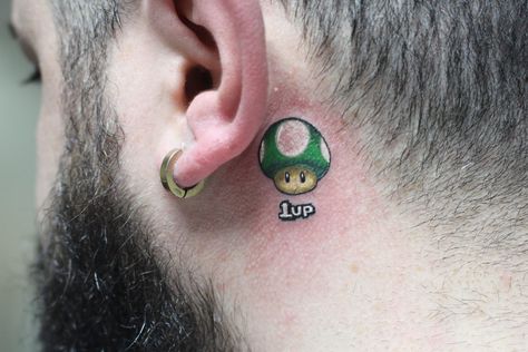 One Up Mushroom Mario Tattoo, 1up Tattoo, Mario Mushroom Tattoo, Mario Tattoo, Le Tattoo, Mushroom Tattoo, Mushroom Tattoos, Face Tattoos, Wrist Tattoo