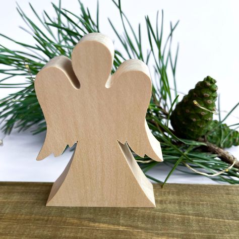 Small primitive wooden angel that will be a figure for table, shelf. Christmas angel gift for children's. Miniature Wooden Angel. Farmhouse Angel. Unfinished standing angel cutout. A great gift for family and friends. You can give this product as a gift for holidays such as Easter, First Communion, Mother's Day, Christmas. Dimension: Height 10cm (3.93") Width 7cm (2.75") Depth 1.5cm (0.59") ✅ Linden wood.  ✅ Processing time 1-3 days.       Delivery time 14-24 days. ✅You can find more of our products here⬇️ https://www.etsy.com/shop/HeartwoodHarbor?ref=seller-platform-mcnav The main thing! Each product is made entirely by hand, so there may be slight differences from what you see in the photo. These differences do not affect the functionality of the product. But don't worry: for each order Angel Cutout, Shelf Decor Christmas, Angel Shelf, Wooden Angels, Primitive Angel, Christmas Diy Wood, Wood Angel, Wooden Angel, Angel Gifts