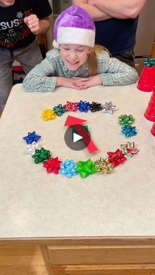 974K views · 3.5K comments | Hilarious Christmas Bow Family Game 🎁 | Hilarious Christmas Bow Family Game 🎁 Mom, dad, kids and the whole family play funny Christmas bow spinner game for fun holiday prizes. Spin to the... | By Benson Bros | Facebook Spin The Christmas Bow, Christmas Bow Spinner Game, Spin The Bow Christmas Game, Bow Spinner Christmas Game, Christmas Bow Game, Benson Bros, Spinning Wheel Game, Christmas Snack Mix, Holiday Party Activities