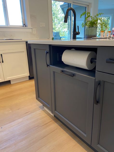 Perfect spot for the ever used paper towel, situated at the key prep area of the island, with garbage / recyle drawers below, compost cupboard to the left and knives draw, chopping boards and sheet pans to the right. Perfection Paper Towel Holder For Island Sink, Future House Kitchens, Arizona Kitchen, Pull Out Bin, Drawer Paper, Under Kitchen Sink, Sink In Island, Sheet Pans, House Updates