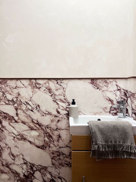 This Powder Room Features a Realistic-Looking Stone Wallpaper Anaglypta Wallpaper, Calacatta Viola Marble, Viola Marble, Powder Bathroom, Powder Room Wallpaper, Calacatta Viola, Half Walls, Old Bathroom, Stone Wallpaper