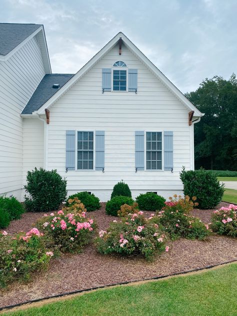 Our Home Exterior Makeover – Pop of Pippi Vinyl Siding Homes Exterior, White House Blue Shutters French Country, Cream House Blue Shutters, Vinyl House Exterior, Vinyl Siding Ideas Exterior, White Siding House, Fixer Upper Exterior, White Vinyl Siding, Exterior Refresh