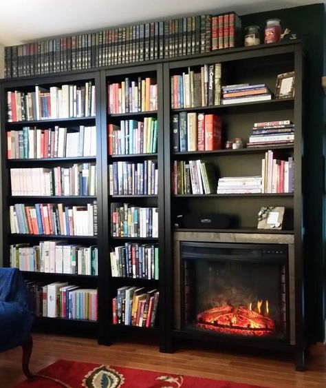 Materials: Two full-size and one narrow Hemnes bookshelves I had a spare wall in my living room, but wanted both a lot of book storage and a fireplace. I checked the dimensions of the Hemnes bookshelf, and discovered an electric fireplace insert that fit with just a little extra space. I used this AKDY 28 inch … Bookshelves Around Fireplace, Small Electric Fireplace, Hemnes Bookcase, Fireplace Bookcase, Library Fireplace, Billy Ikea, Guest Bedroom Remodel, Fireplace Bookshelves, Small Bedroom Remodel