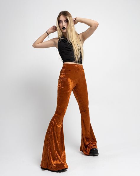 Festival vibes 🖤 The velvet pants and the hooded velvet top. Pants are also available in wine. Would you like it in other colors? Black, maybe green? And of course, the top, is available in lots of colors. . . #festivalvibes #festivaloutfit #westernstyle #burningmanstyle #hippiegoth #hippiestyle #festivalfashion Orange Bell Bottoms, Velvet Bell Bottoms, Festival Mode, 70’s Style, Bell Pants, Velvet Flares, Work Clothing, Festival Clothing, Stretchy Pants