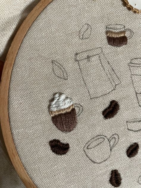 Coffee embroidery pattern in progress Coffee Hand Embroidery, Coffee Shop Embroidery, Embroidery Coffee Cup, Coffee Embroidery Designs, Coffee Embroidery Patterns, Coffee Cup Embroidery, Xmas Crackers, Coffee Symbol, Embroidery Icons