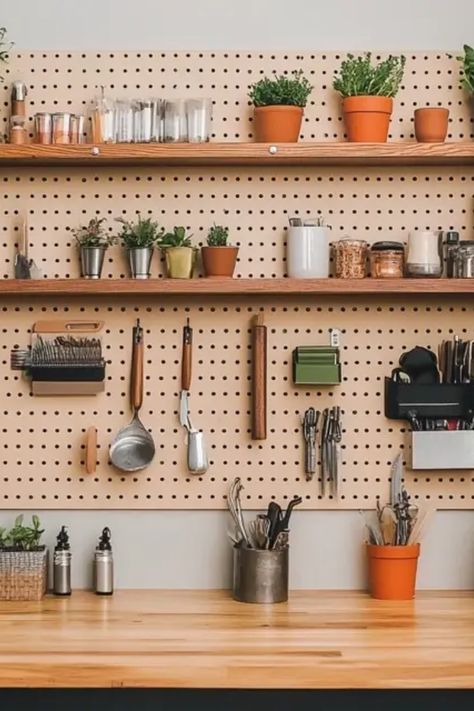 Turn your cluttered space into an organized paradise with our easy DIY pegboard organizer guide! This creative project is perfect for anyone looking to maximize storage while adding a stylish twist to their home or workspace. Discover how to use pegboards for organizing everything from craft supplies and tools to kitchen utensils and office essentials. By following easy steps and using the right materials, you can customize your pegboard to fit your needs and tastes. Say goodbye to messy spaces—life is better when you're organized! Pegboard Kitchen Backsplash, Crafting Pegboard Ideas, Peg Board Home Office, Peg Board Shelves Diy, Pegboard Kitchen Ideas, Peg Board Kitchen Wall, Peg Board In Kitchen, Pegboard Office Wall, Artist Pegboard