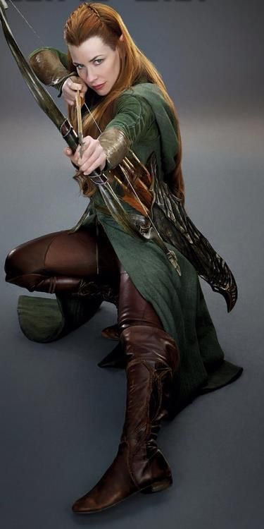 Evangeline Lilly as Tauriel- who wasn't suppose to be in The Hobbit: Desolation of Smaug but I still liked her because she was awesome. Nicole Evangeline Lilly, John Howe, The Hobbit Movies, Desolation Of Smaug, Tauriel, Evangeline Lilly, Bow And Arrow, Living Dolls, Thranduil