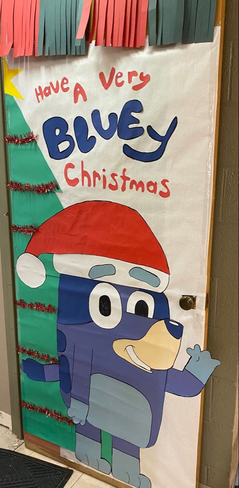 Character Door Decorations Classroom, Christmas Door Ideas For Preschool, December Bulletin Board Ideas For School, Disney Christmas Bulletin Boards, Classroom Door Winter Theme, Bluey Bulletin Board Ideas, Winter Themed Doors For School, Bluey Classroom Themes, Disney Door Decorations Classroom