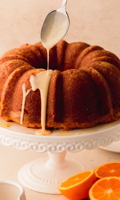 This Glazed Orange Bundt Cake is a slice of heaven that you are going to love! This delicious and tender cake is infused with the vibrant flavor of orange zest which makes each bite a burst of citrusy goodness. It gets not one, but two delicious glazes. The sugar glaze coats the cake with a sweet and glossy finish, while the powdered sugar glaze adds an elegant touch and an extra hint of sweetness. Orange Cake Glaze, Orange Bunt Cake, Orange Glaze Cake, Bundt Cake Glaze, Lemon Pistachio Cake, Orange Zest Cake, Cake Glaze, Chocolate Raspberry Brownies, Orange Bundt Cake