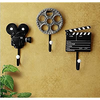 Antique Bronze Metal Movie Reel Wall Art: Amazon.ca: Home & Kitchen Movie Theme Decorations, Film Equipment, Movie Room Decor, Perfume Vintage, Resin Storage, בר מצווה, Utility Hooks, Clothes Hooks, Household Cleaning Supplies