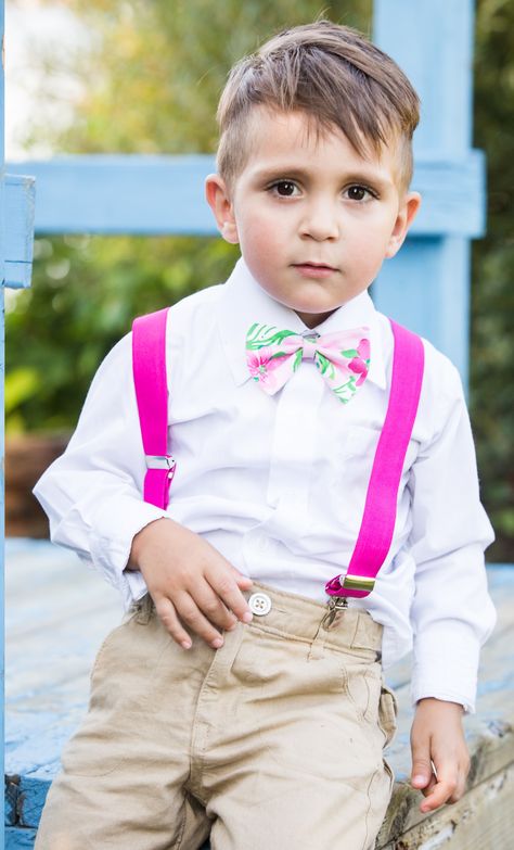 He looks incredible ! Ring bearer suit outfit Hot pink Wedding Son suit wedding Ring Bearer Outfit Pink, Pink Groomsmen, Ring Bearer Suit, Hot Pink Wedding, Orange And Pink Wedding, Hot Pink Weddings, Ring Boy, Bearer Outfit, Suit Outfit