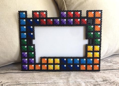 Tetris Video Game Perler Bead Pixel Art Photo Frame Video Game | Etsy Hama Bead Photo Frame, Perler Photo Frame, Perler Picture Frame, Perler Bead Polaroid Frame, Perler Bead Light Switch Frames, Perler Bead Picture Frames, Photo Frame Video, Bead Pixel Art, Beads Painting