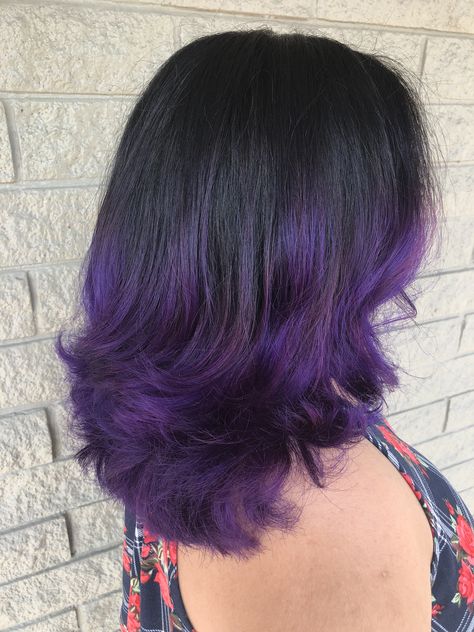 Hair Color Black And Purple, Black Fade Into Purple Hair, Black Fading Into Purple Hair, Short Hair With Purple Ends, Dark Purple Ends Hair, Black Roots With Purple Hair, Black And Purple Wolfcut, Butterfly Haircut Purple Hair, Purple Highlights In Dark Brown Hair