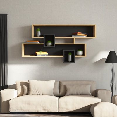 This Wall Shelf's sleek and modern style makes it the ideal accent piece for any space. This shelf is the perfect answer whether you want to show off your favorite books, decorative objects, or just keep your necessities close at hand. It is a real statement piece because of its striking contrast of white and walnut, which elevates any design. With the simple installation method that comes with it, you can quickly and easily attach our Wall Shelf to the wall. Its dimensions allow it to suit well Simple Bookshelf Design, Shelf Book Wall, Bookshelf Design Wall, Book Shelf Wall Ideas, Open Shelves Bedroom, Bedroom Shelf Decor Ideas, Wall Shelves For Books, Book Shelves Diy, Dt Coursework