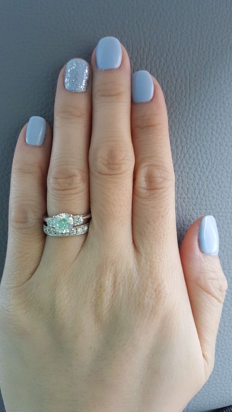 Gel Nails Ideas Light Blue, Cute Light Blue Nails Short, Light Blue Nails With Glitter Accent, Light Blue With Glitter Nails, Light Blue Manicure Ideas, Light Blue And Silver Nails Short, Blue Nails With Sparkle Accent, Light Blue Nails With Silver Glitter, Dip Powder Nails Light Blue