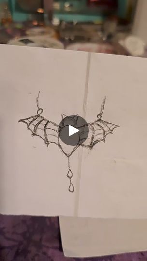 26 reactions | Wire wrapping some spooky Halloween themed pieces this weekend 🦇  Thank you to everyone who gave their opinion about the bat pendant! Most of you liked the piece without the dangles, so I listened. Here it is! What do you think? . . . . . . #wirewrap #wirewrapping #wireart #wirebending #imakethings #makersgonnamake #unique #oneofakind #smallbusiness #smallbusinesscheck #crystals #jewelrymaking | Kristy Rotkiske | Zingara · Spell on You Bat Pendant, Wrap Necklaces, Wire Pendant, Wire Wrapped Necklace, Wire Art, Diy Pendant, Wire Wrap, Spooky Halloween, Nightmare Before Christmas